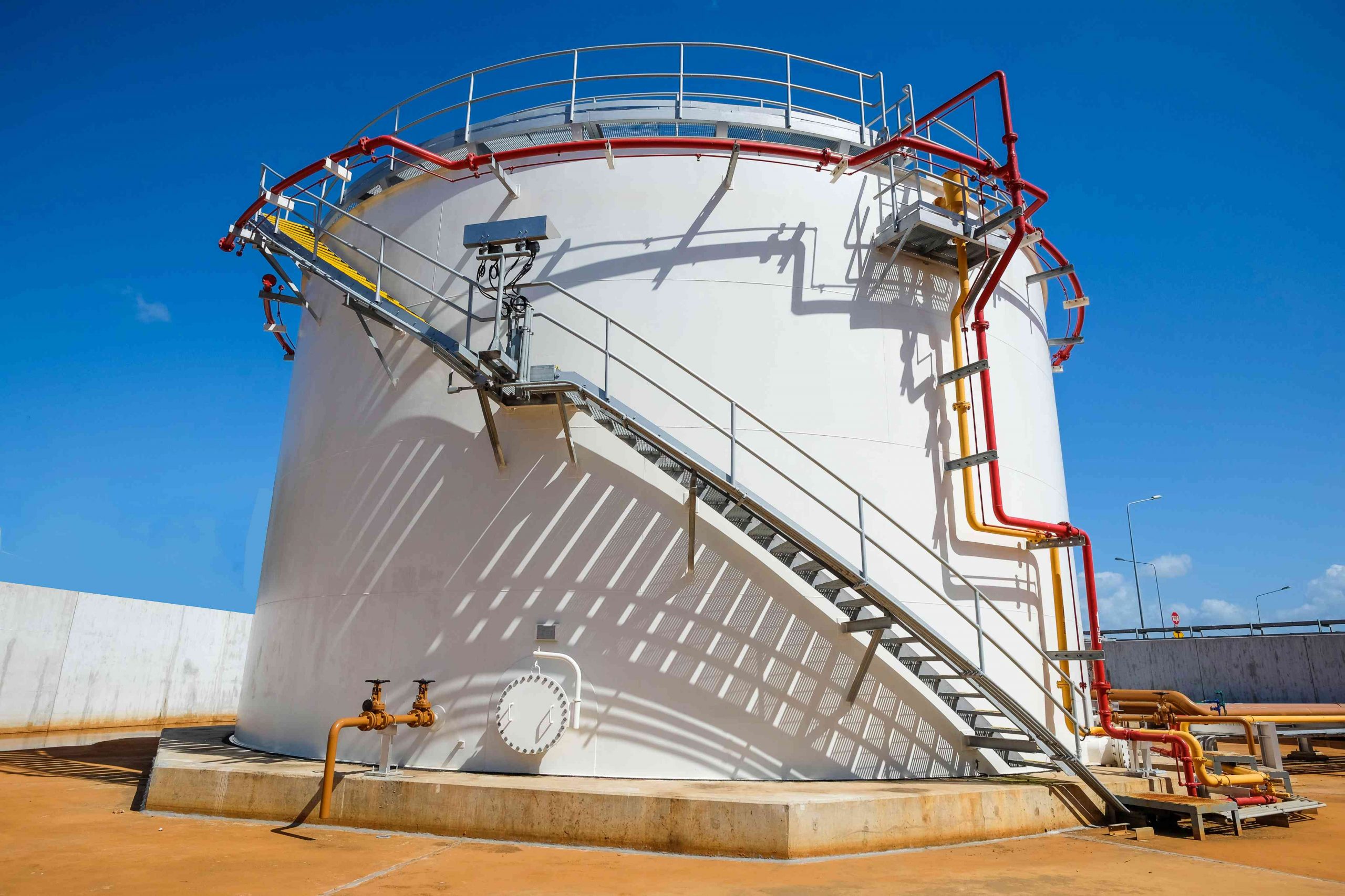 Image of industrial storage tank with fire protection system